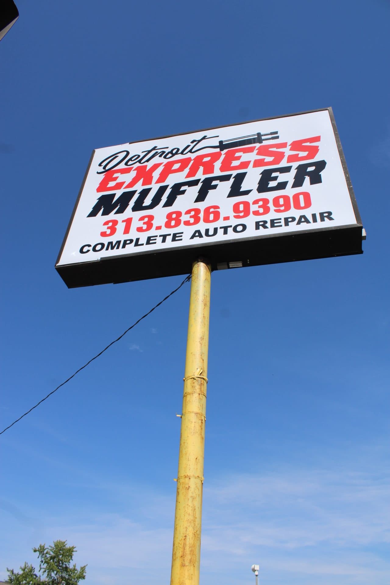 Detroit Express Muffler sign